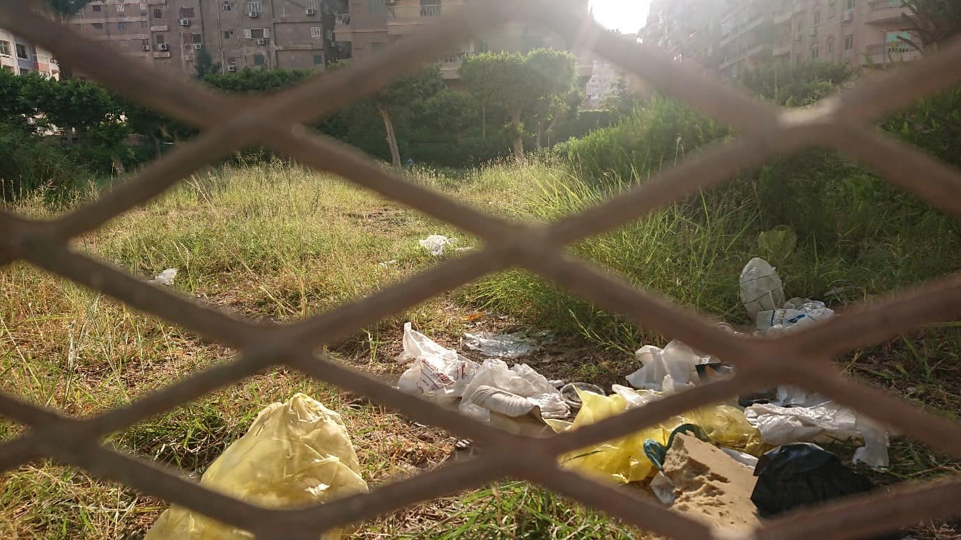 Fenced green spaces in Cairo with no public access